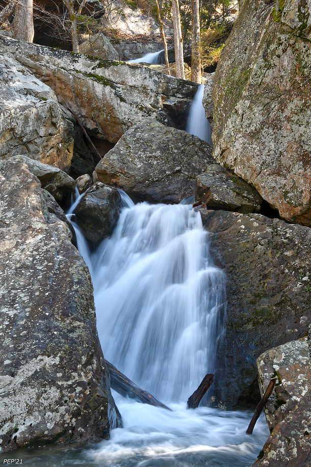 Waterfall And Boulders
