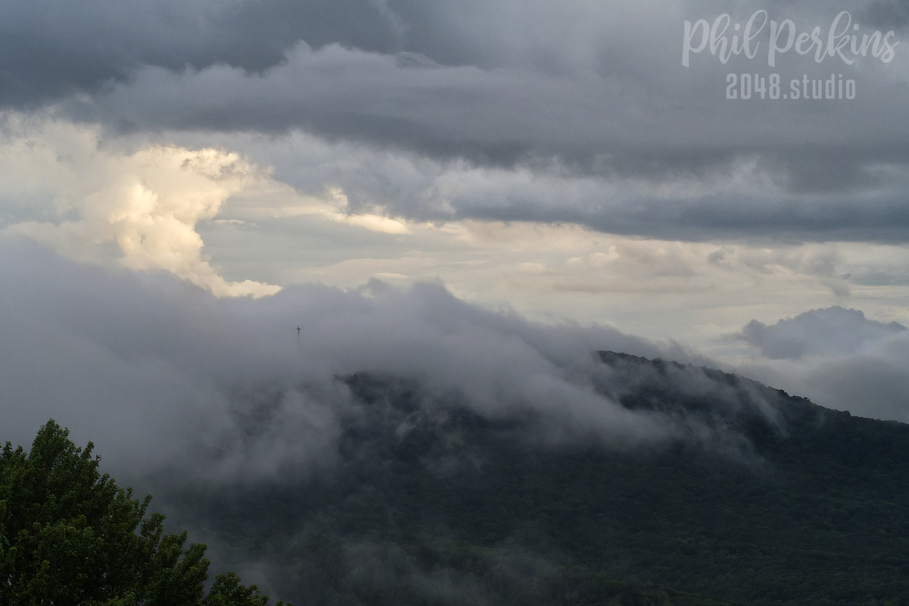 Misty Mountains Under Moody Skies